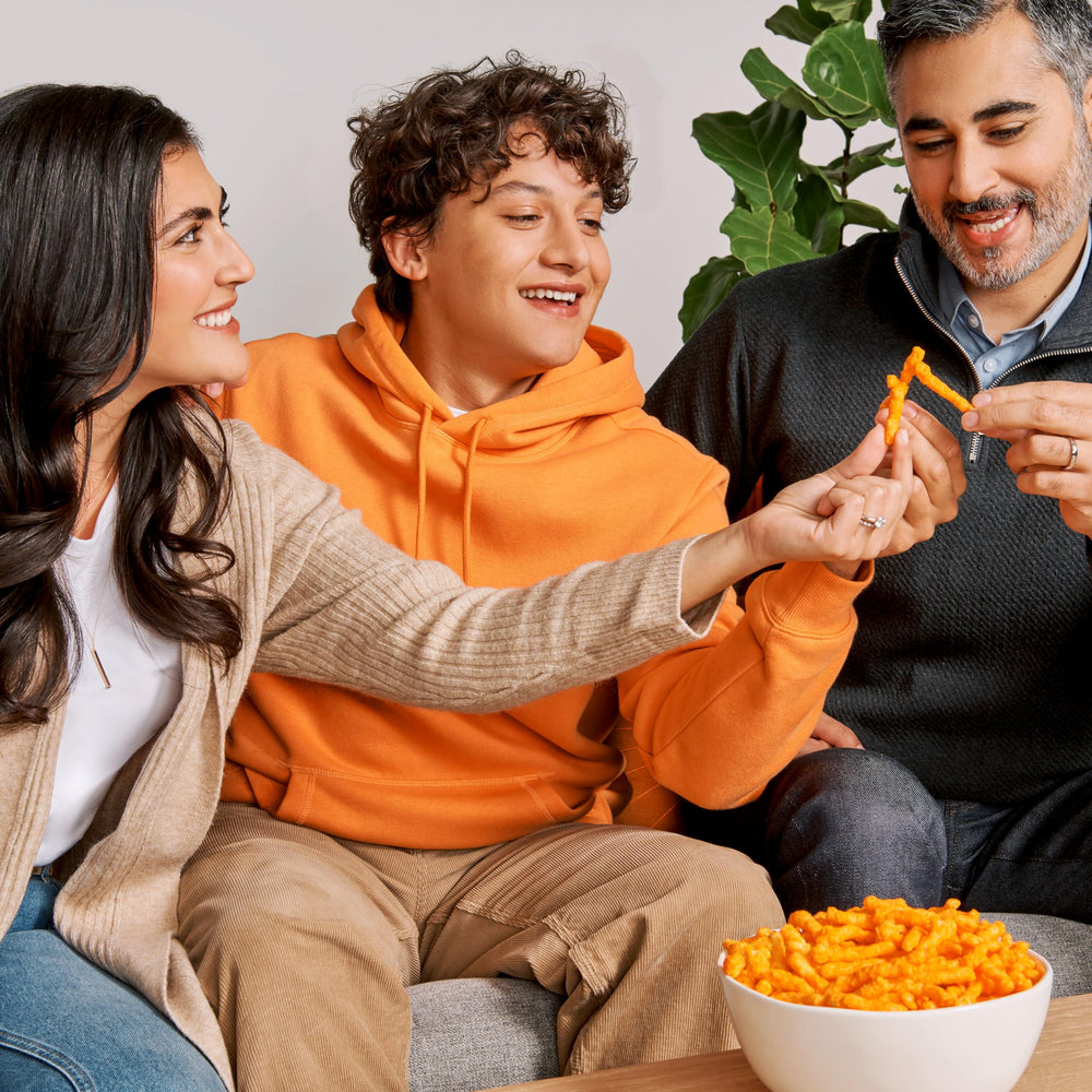 SunChips Harvest Cheddar close-up illustrating crispy wholesome crunch for on-the-go snacking