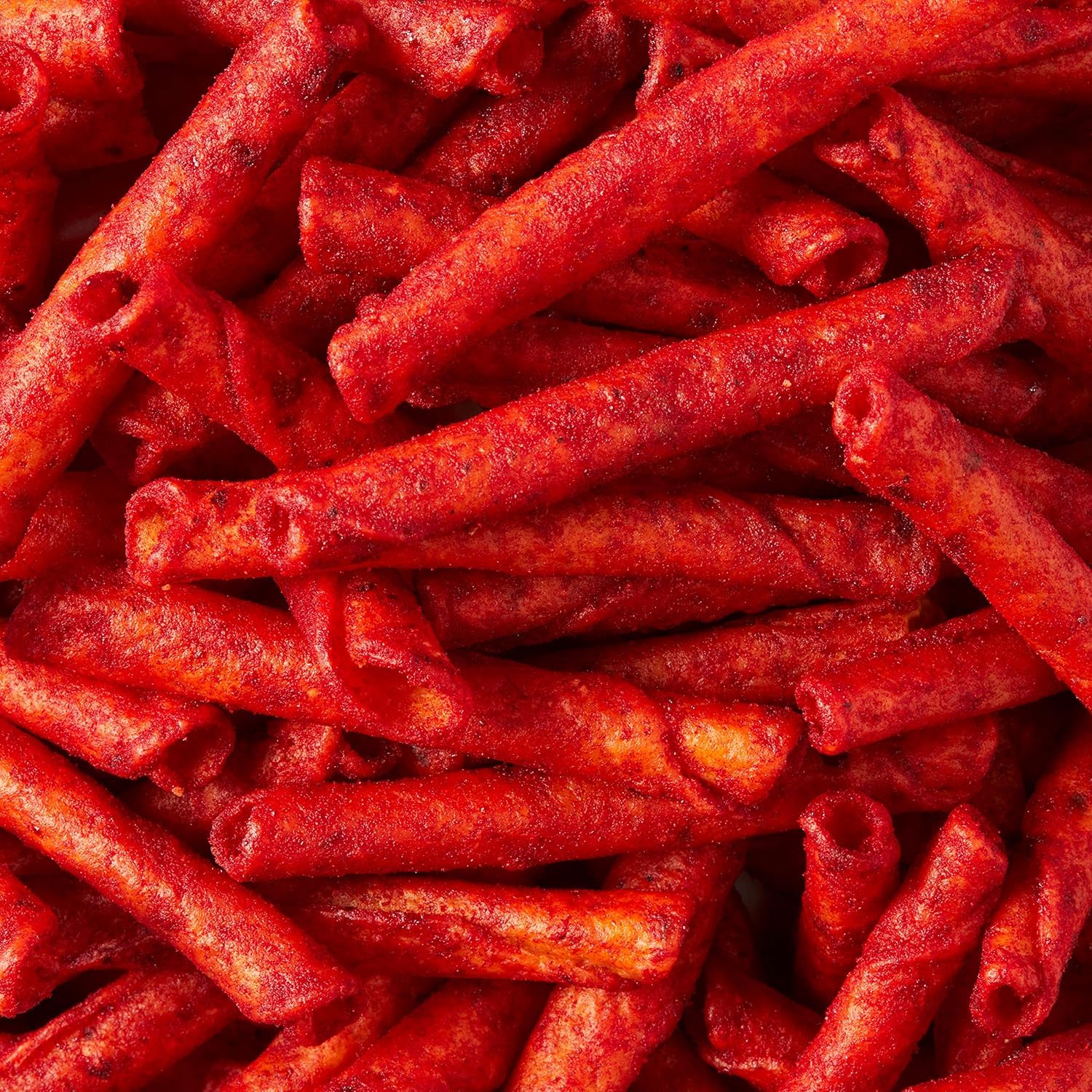 Frito-Lay Fiery Mix Doritos Flamin' Hot Nacho bag fuels snack cravings.