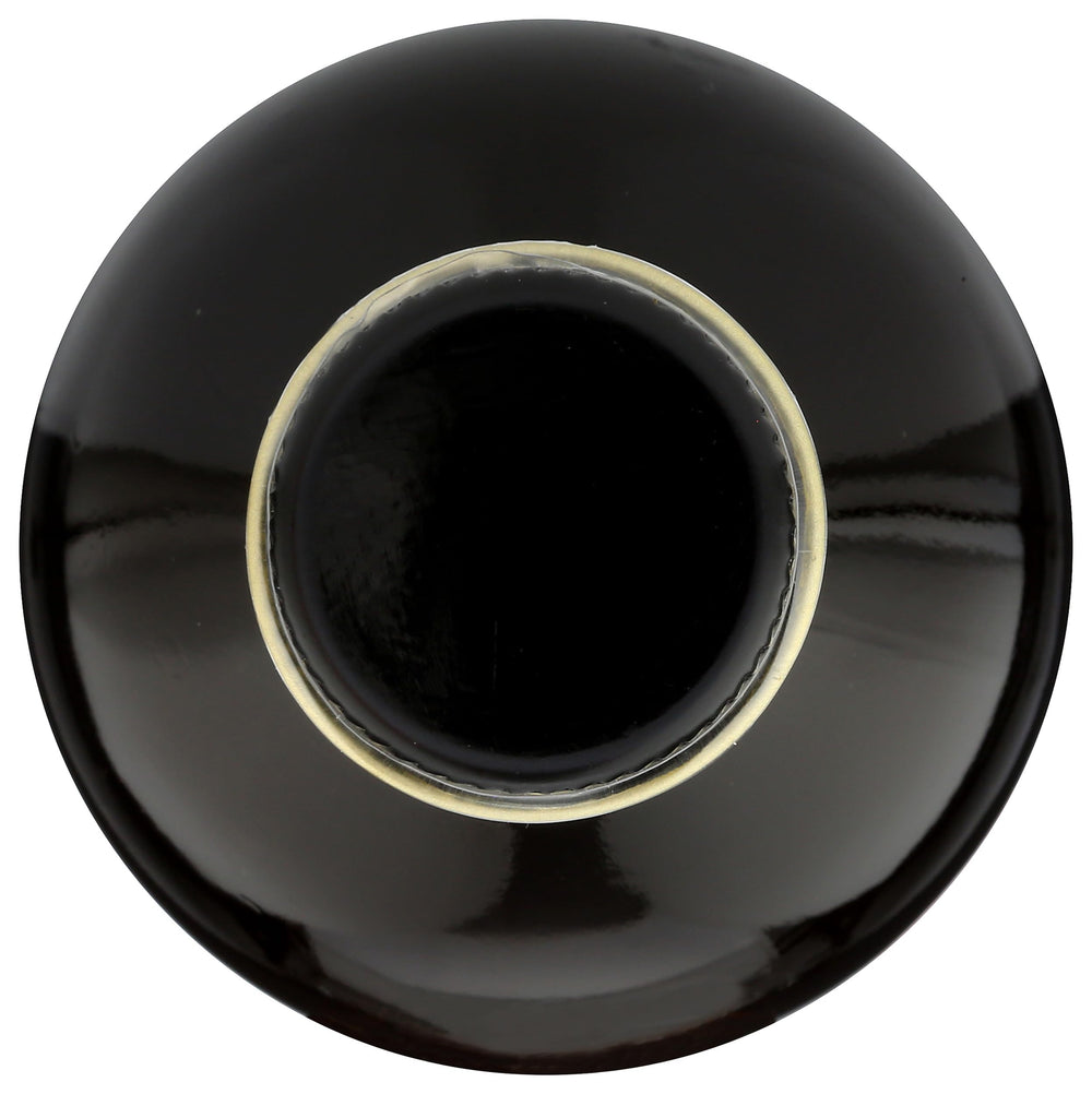 Frontier Co-op vanilla extract on a dessert plate for a warm finish