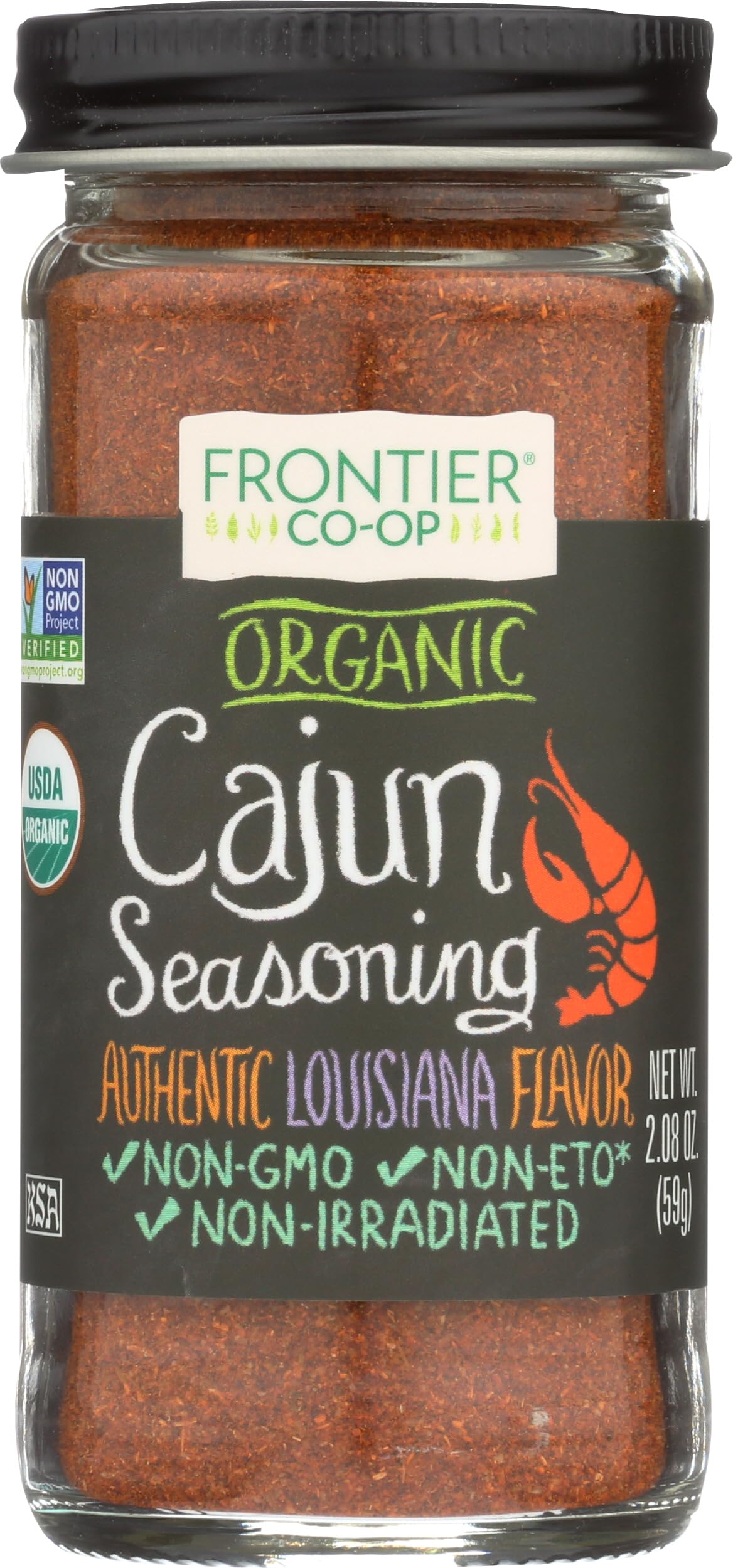 Frontier Co-op Cajun seasoning bottle on kitchen counter adds bold Louisiana flavor to meats
