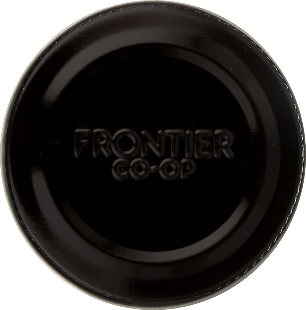 Frontier Organic Poultry Seasoning in a bowl with vegetables.