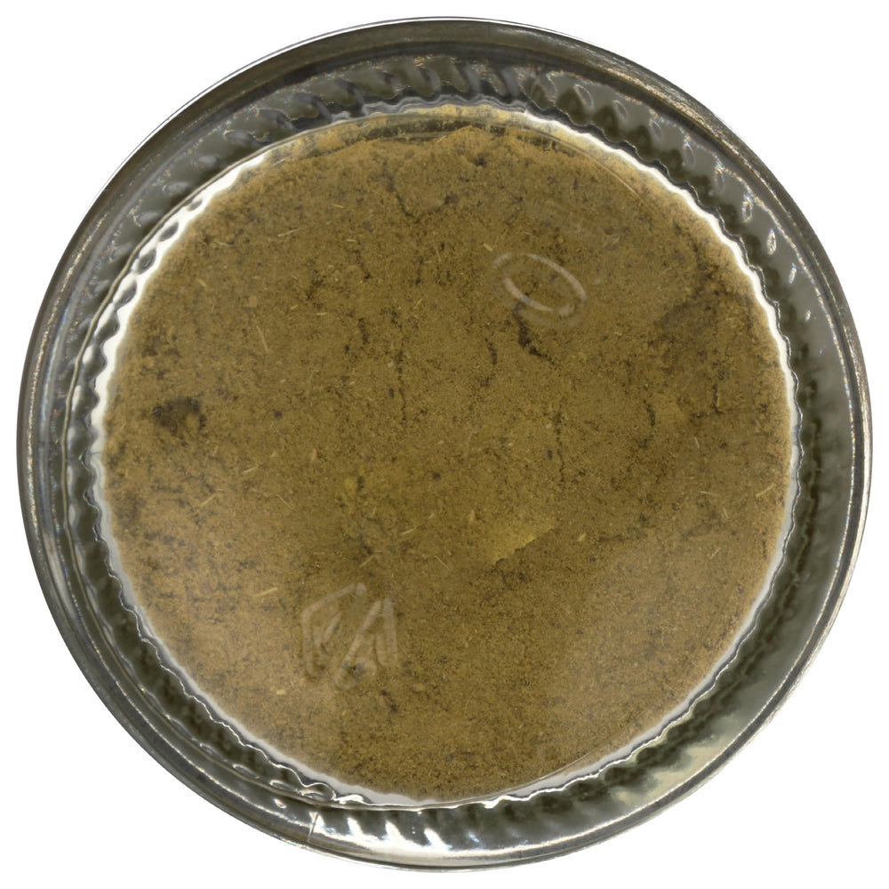 Frontier Organic Poultry Seasoning on a kitchen counter.
