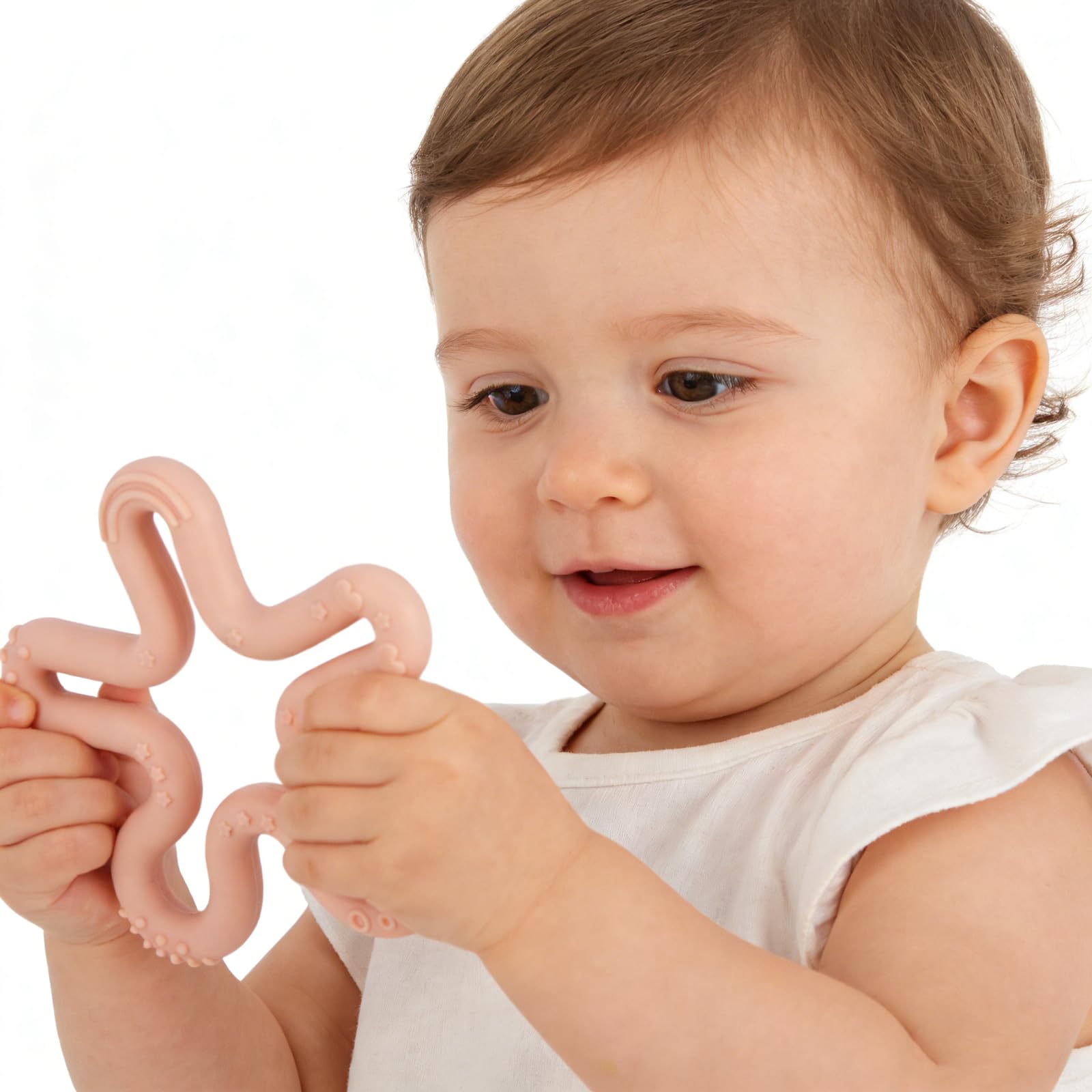 Fu Store coral flower teether in hand, easy-to-grasp design for on-the-go soothing.