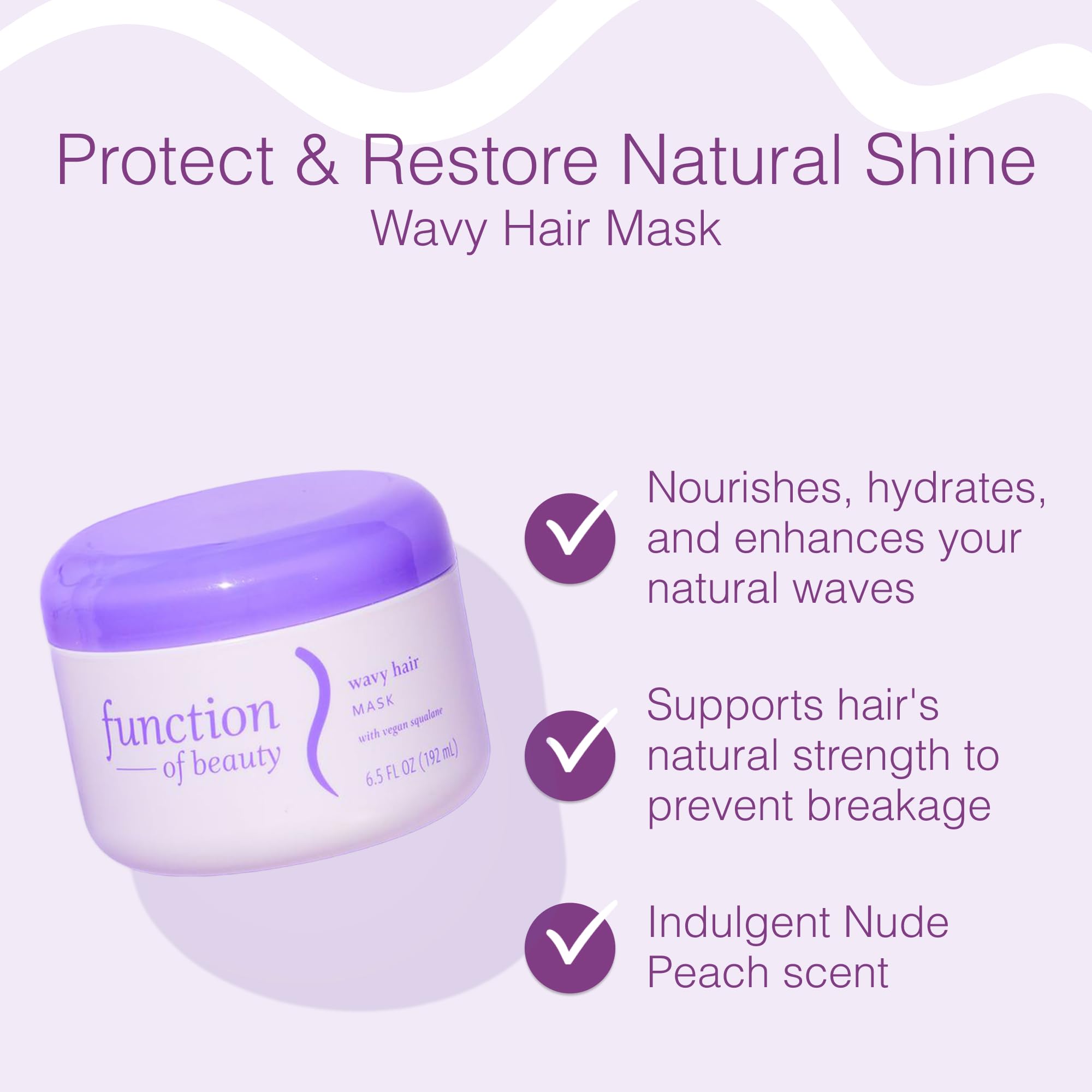 Bottle of Function of Beauty Wavy Hair Mask during application on defined waves.