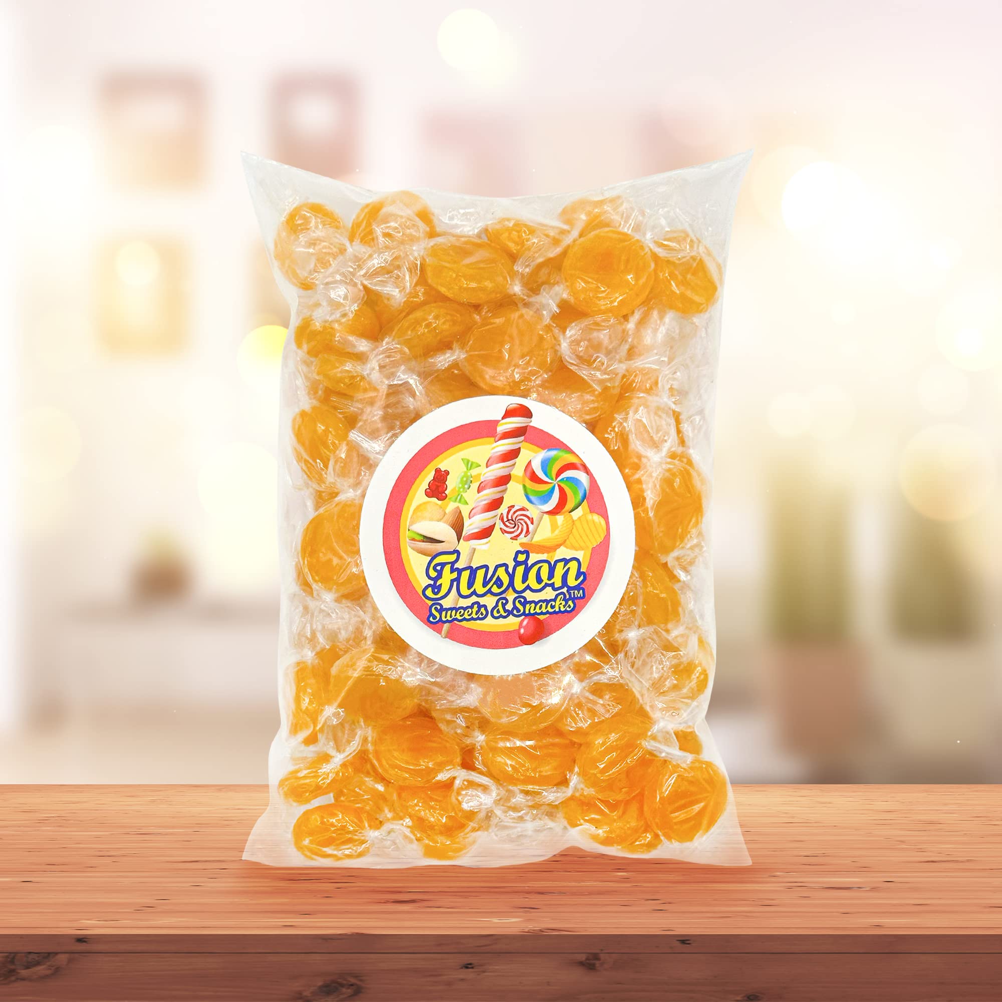 Fusion Sweets And Snacks butterscotch hard candy at a party table for guests.