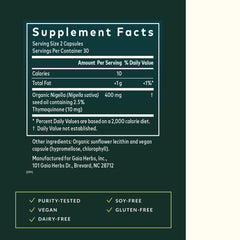 Gaia Herbs Black Seed Oil capsules being poured from the bottle for quick daily use.
