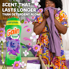 Beads dissolving in hot and cold water release fragrance during wash.
