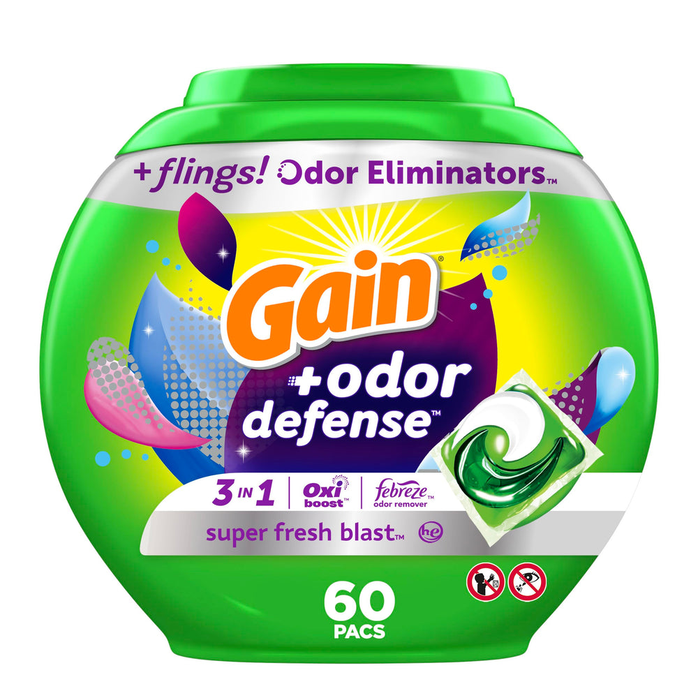 Gain Flings Odor Defense pods shown with a fresh scent, neutralizing tough laundry odors.