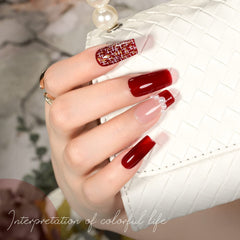 GAOY brush applying sheer red gel for buildable color on nail