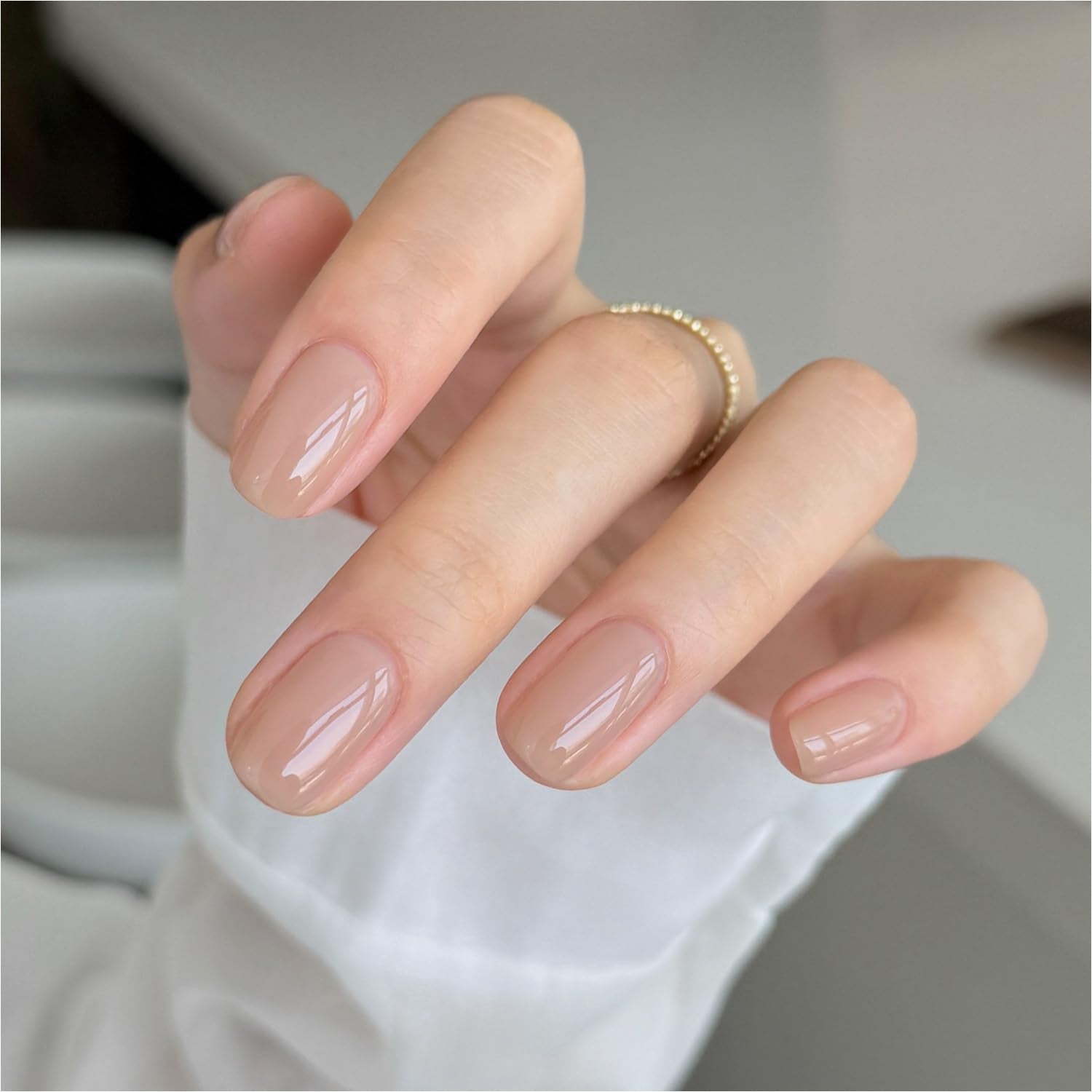 GAOY Nude Jelly Nail Polish bottle close-up showing translucent base for layering at home