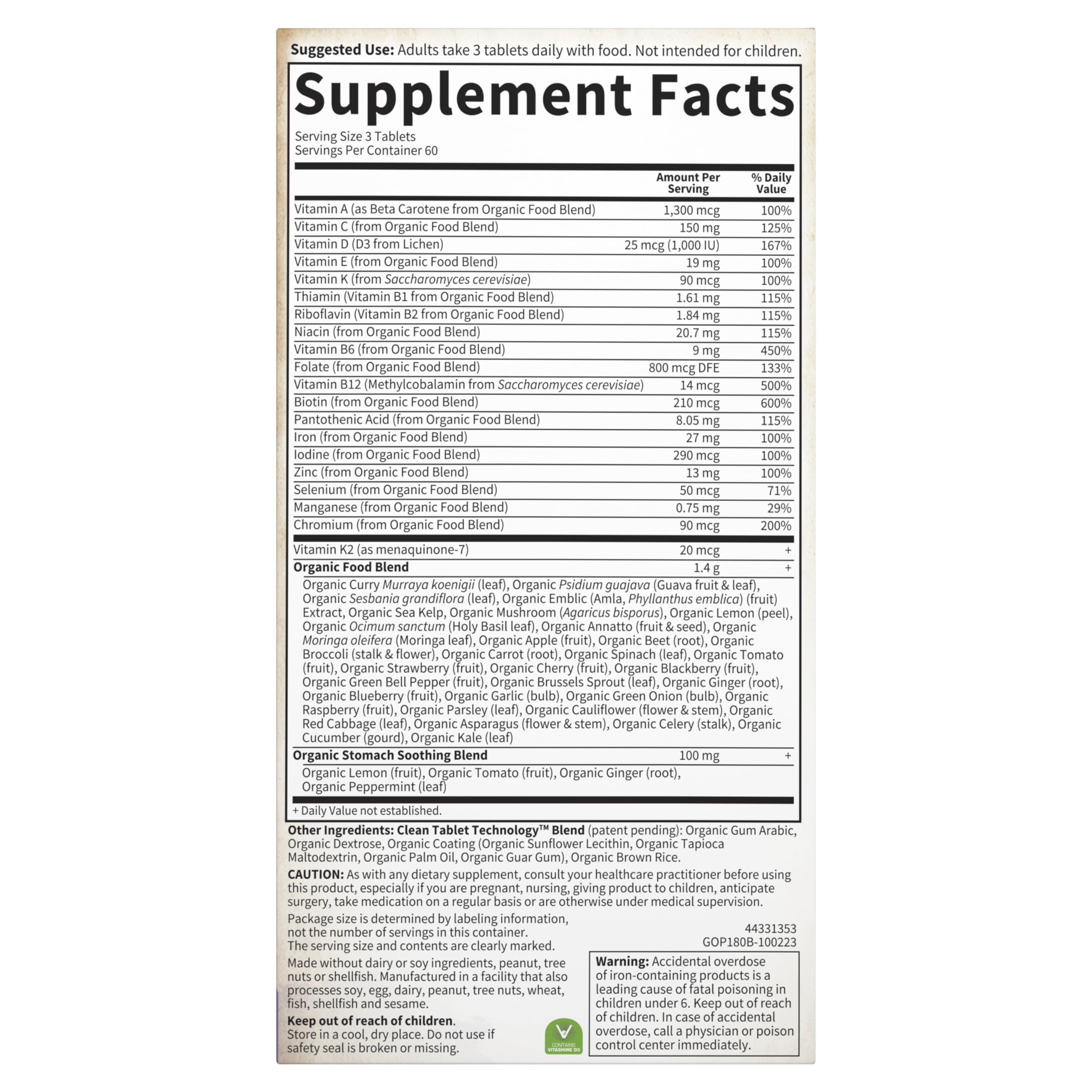 Expectant mom taking Garden of Life Organics Prenatal vitamins during daily routine.