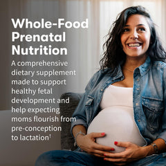 Garden of Life Organics Prenatal tablets poured for easy daily intake.