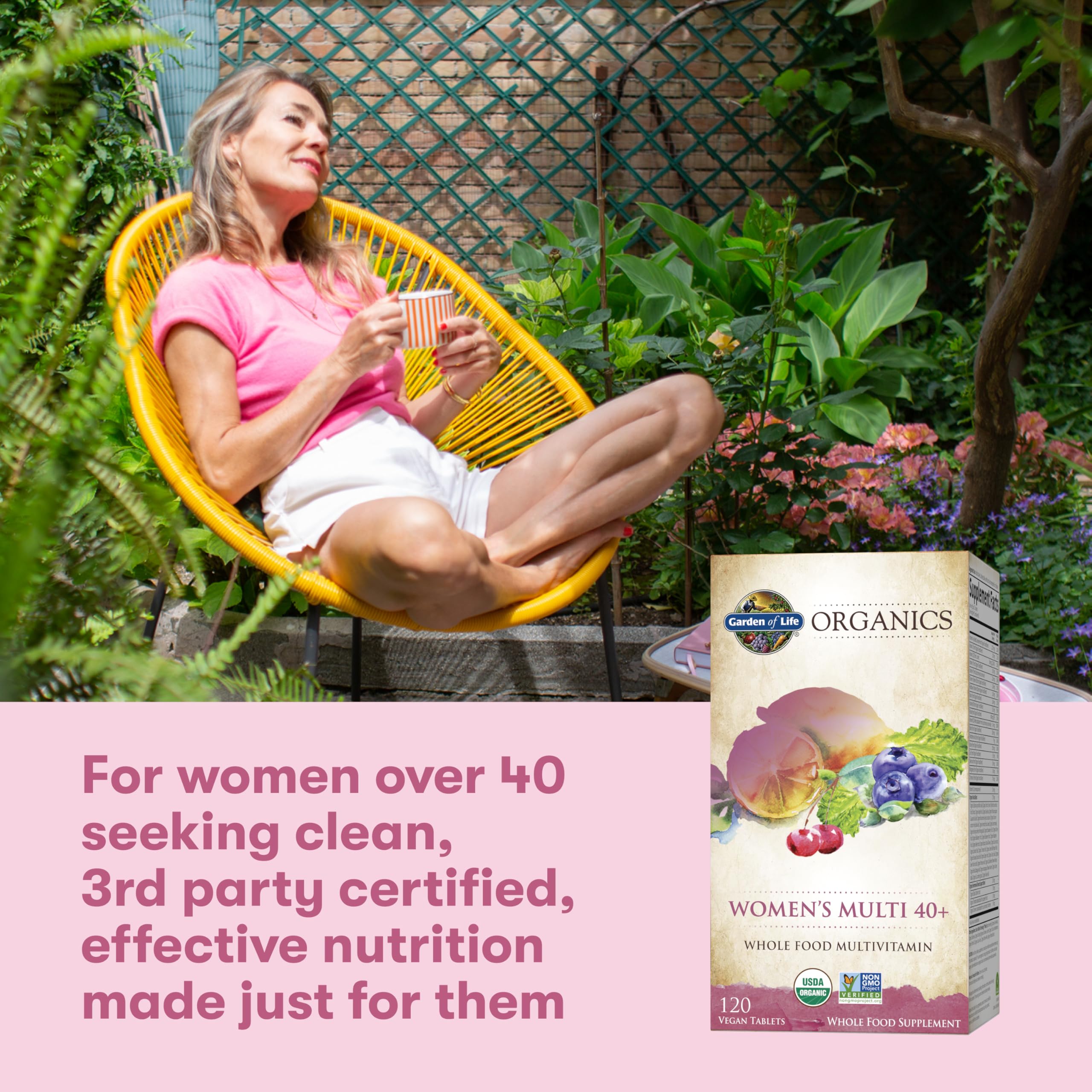 Garden of Life Organics Women 40+ daily-use scene with glass of water.