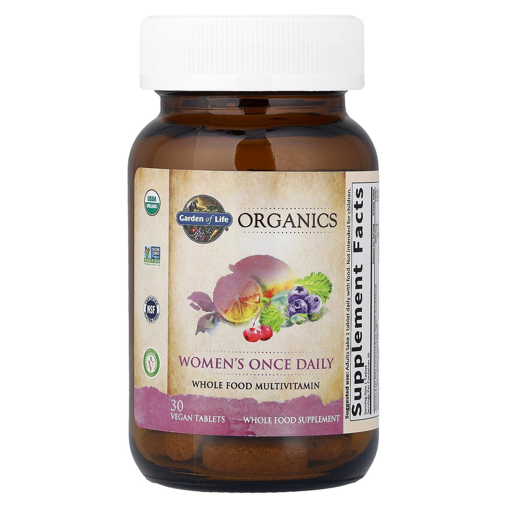 Garden of Life Organics Women’s Multivitamin daily-dose bottle on kitchen counter in natural light.