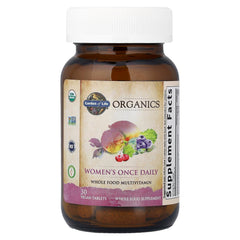 Garden of Life Organics Women’s Multivitamin daily-dose bottle on kitchen counter in natural light.