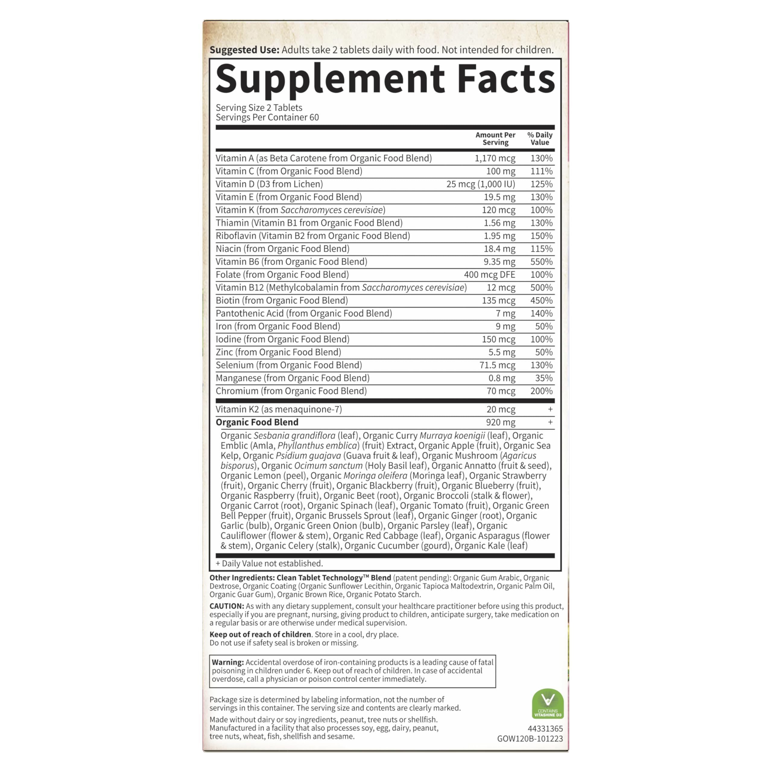 Garden of Life Organics Women's Multivitamin on a shelf display in a store.
