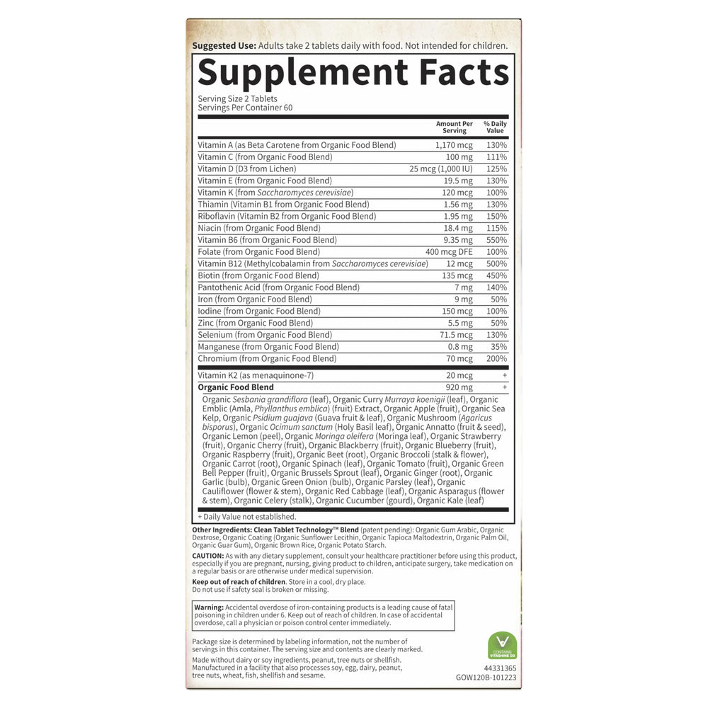 Garden of Life Organics Women's Multivitamin on a shelf display in a store.