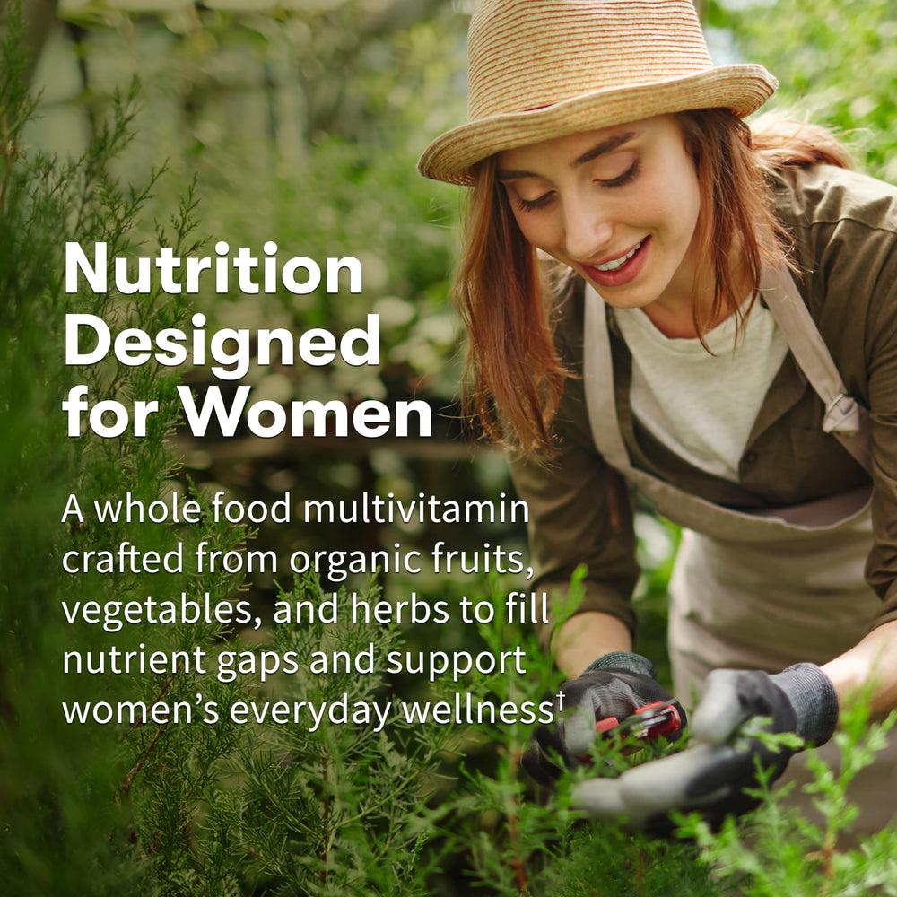 Garden of Life Organics Women's Multivitamin tablet close‑up highlighting iron and B vitamins