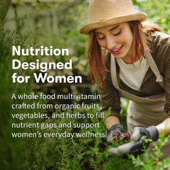Garden of Life Organics Women's Multivitamin tablet close‑up highlighting iron and B vitamins