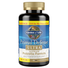 Garden of Life Primal Defense Ultra bottle pouring, supports digestive balance.