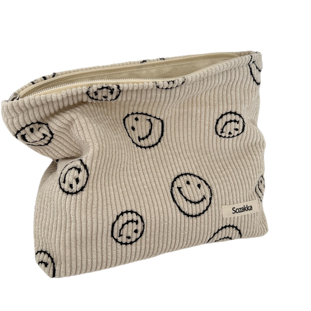 Gardsell corduroy cosmetic bag in beige with smiley dots, ideal for daily makeup organization.