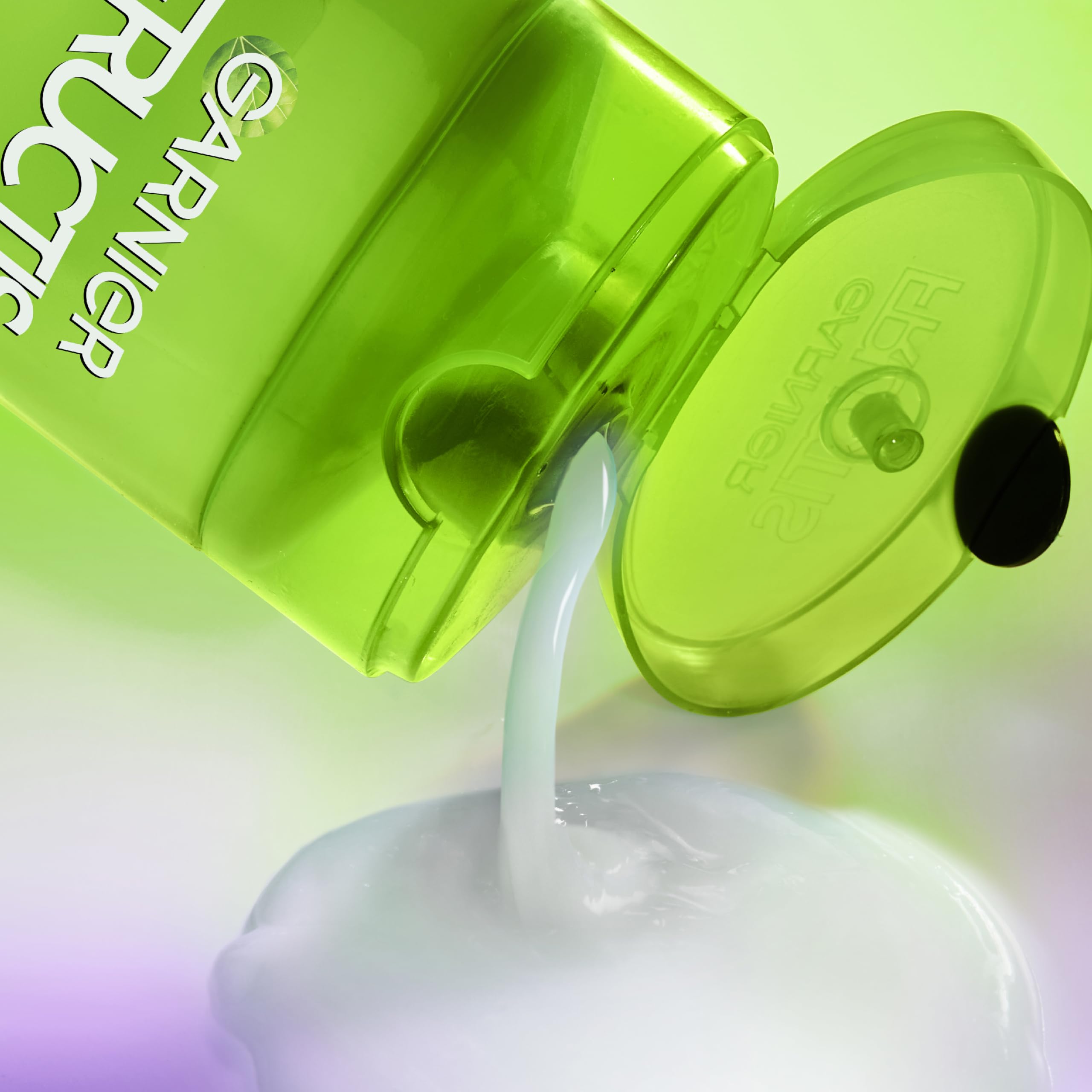Garnier Fructis Curl Nourish Shampoo frizz control for smoother coils.