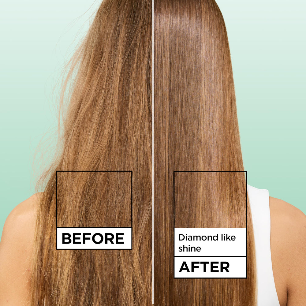Garnier Fructis Diamond Sleek bottle during blow-dry activation for smoother hair.