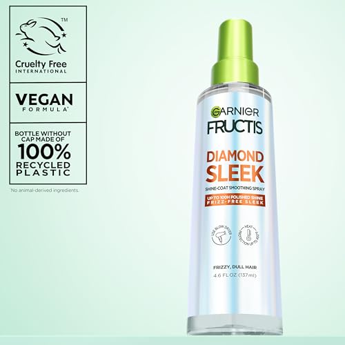 Garnier Fructis Diamond Sleek applied to damp hair after towel dry.