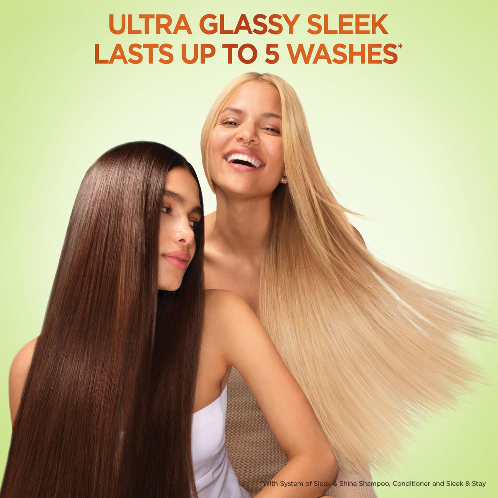 Garnier Fructis Sleek & Shine bottle artwork highlights argan oil benefits.