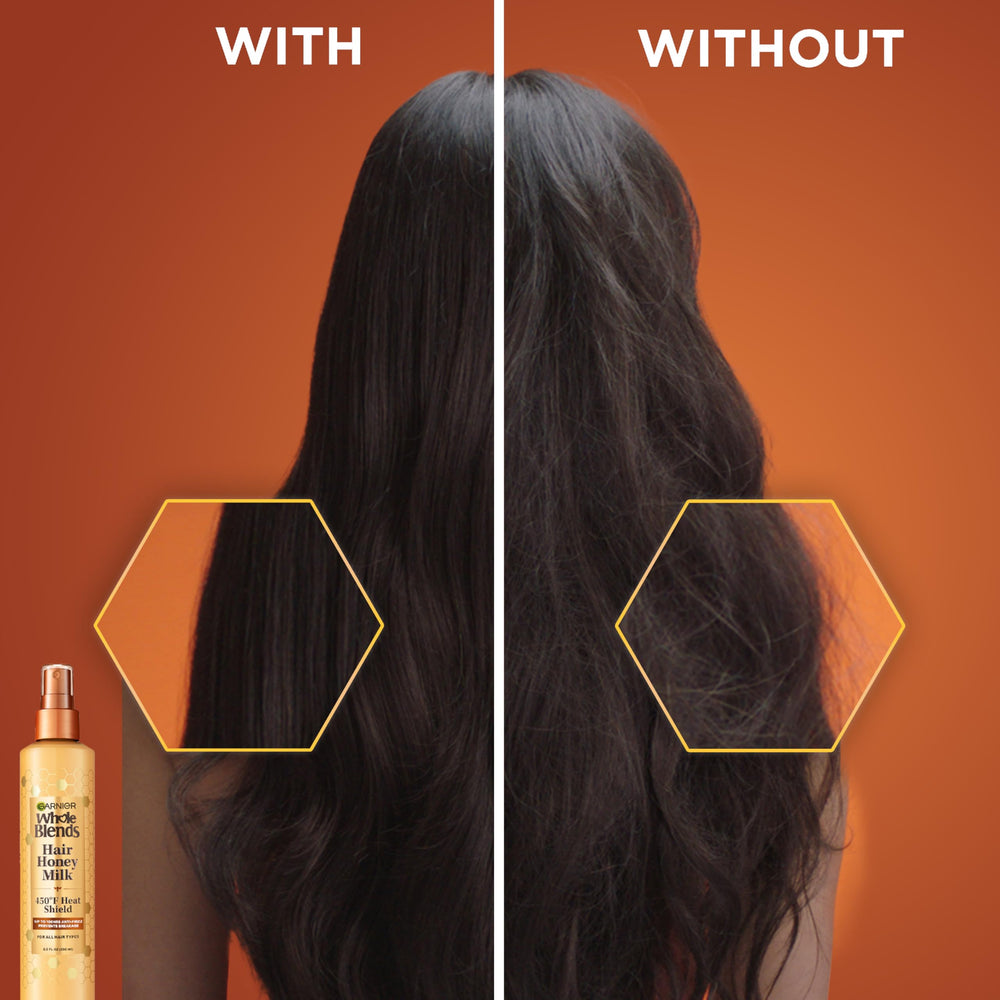 Garnier Honey Milk spray mist on damp hair ready to distribute evenly.
