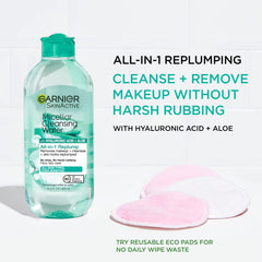 Cotton pad applying Garnier micellar water to face