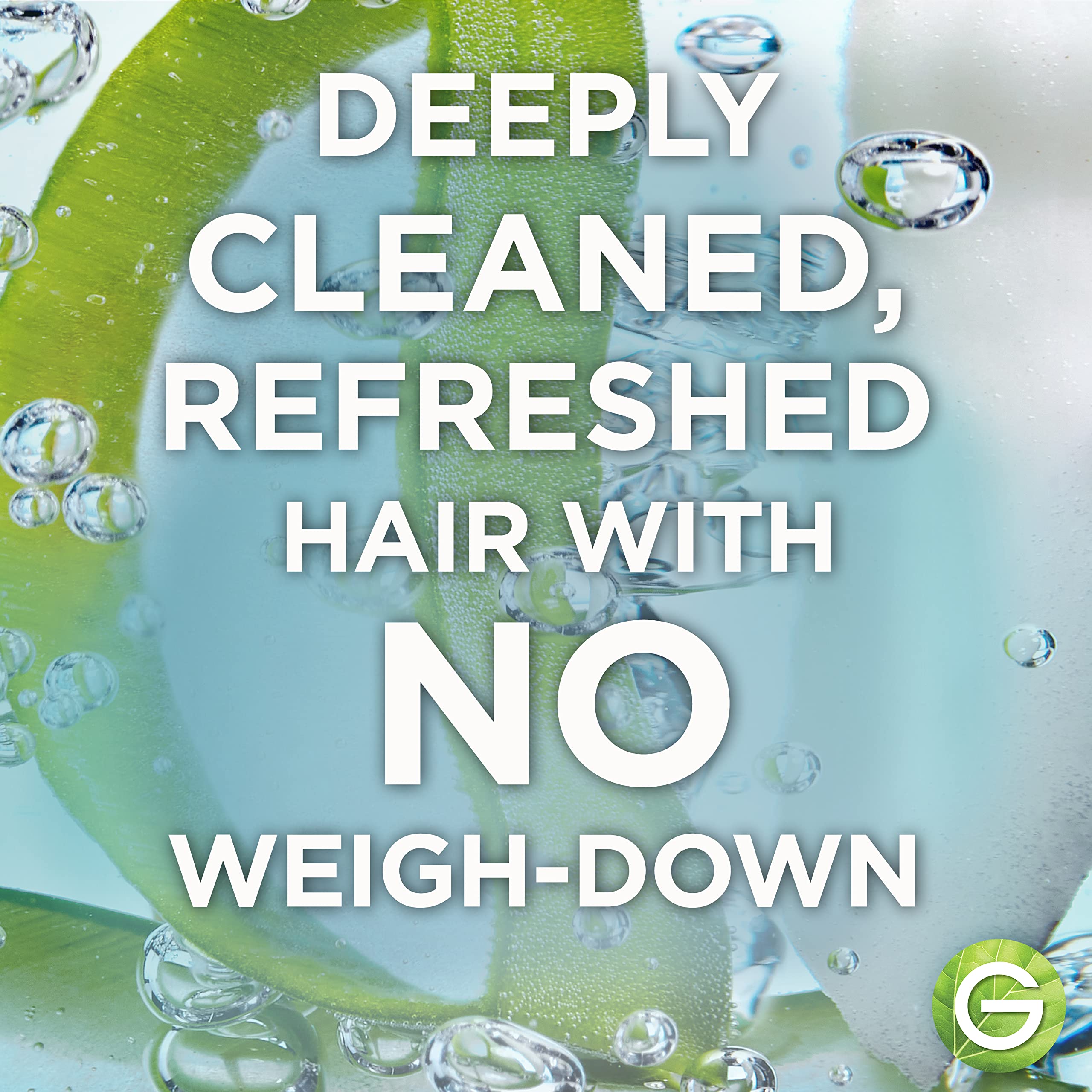 Hand with rich lather from Garnier Whole Blends shampoo delivering silky, hydrated hair