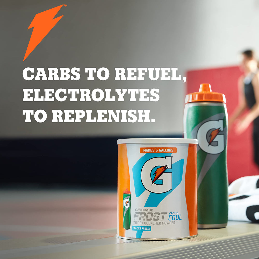 Gatorade G2 grape powder in a mixing cup ready for performance hydration.