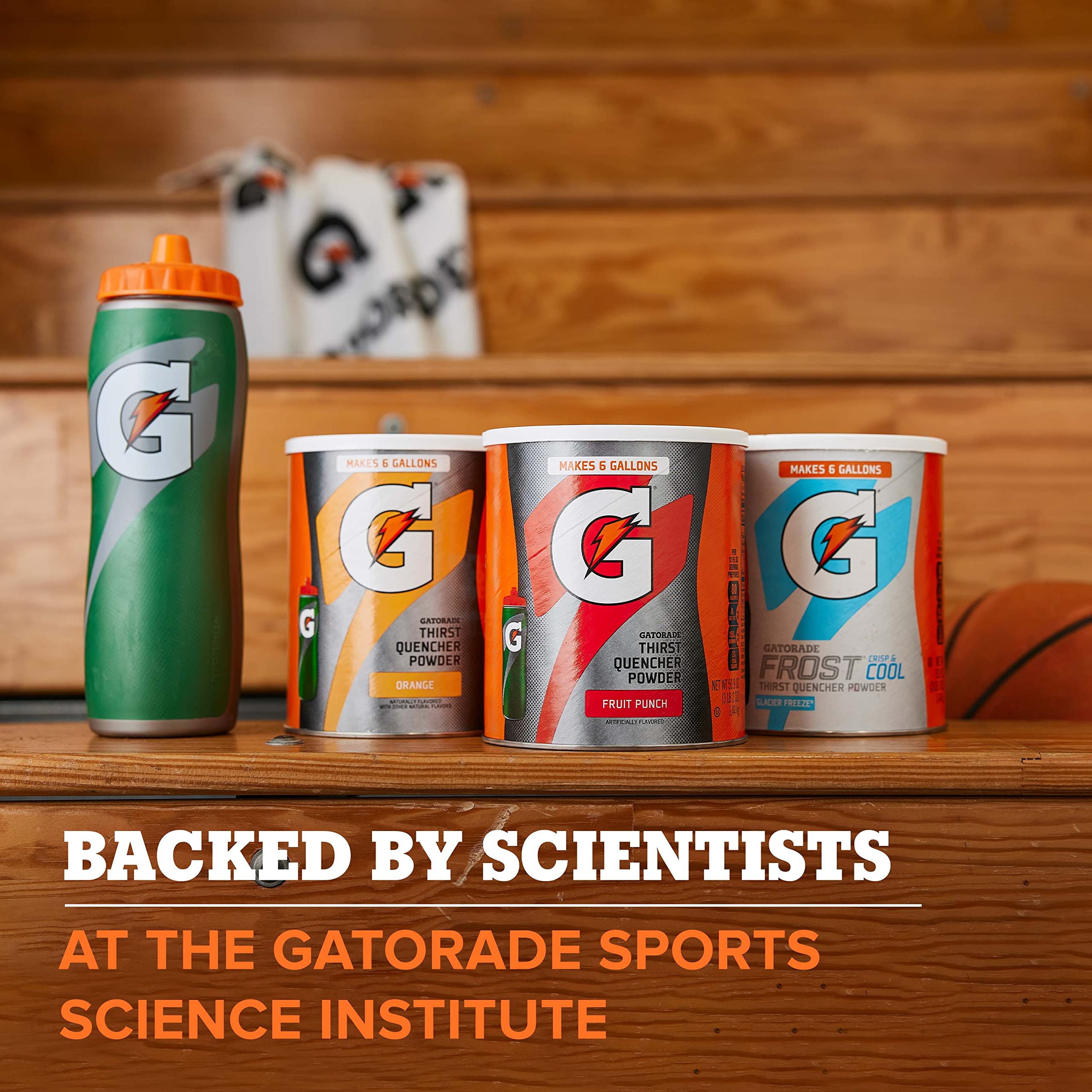 Gatorade Thirst Quencher powder being mixed in water in a glass