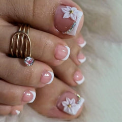 GCSQW French Tip press-on toenails with white flower for chic summer style.