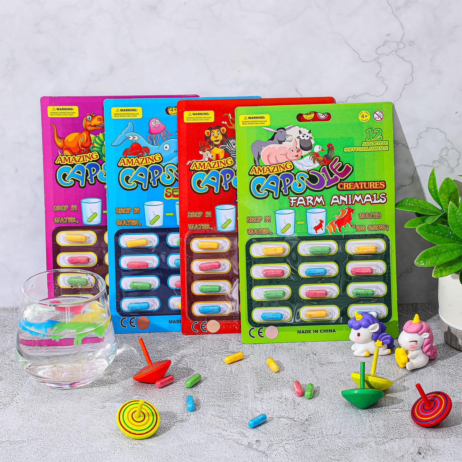 Gejoy zoo animal capsules unveil foam figures for lively party favors.