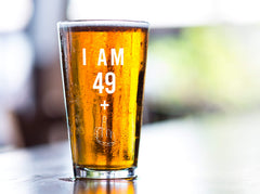 Gelid middle finger graphic 16oz pint glass, perfect for gag gifts.