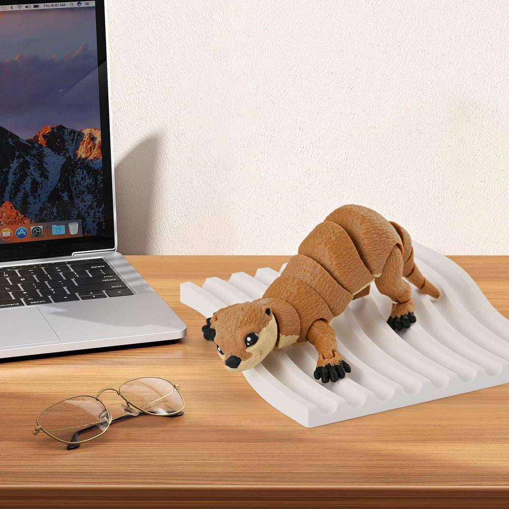 GemmiCho desktop display otter provides a corner of charm on any desk.