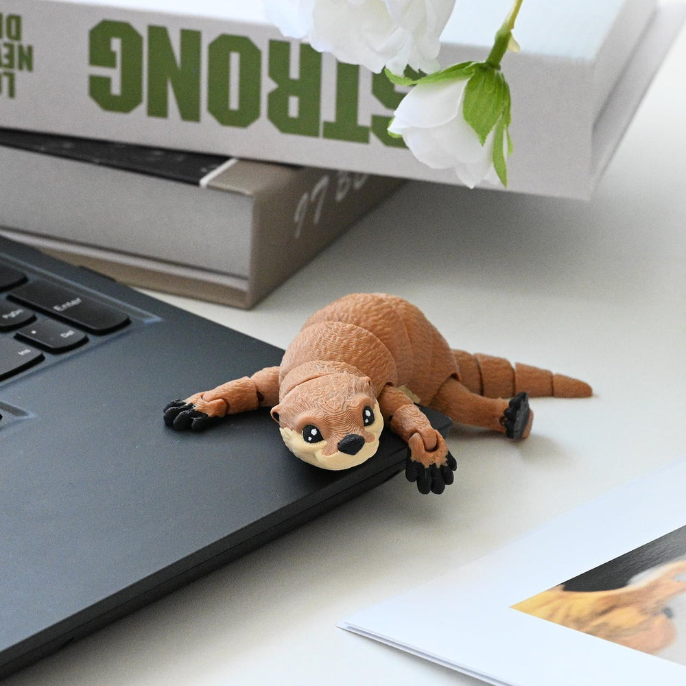 GemmiCho office decor otter makes a thoughtful gift for animal lovers.