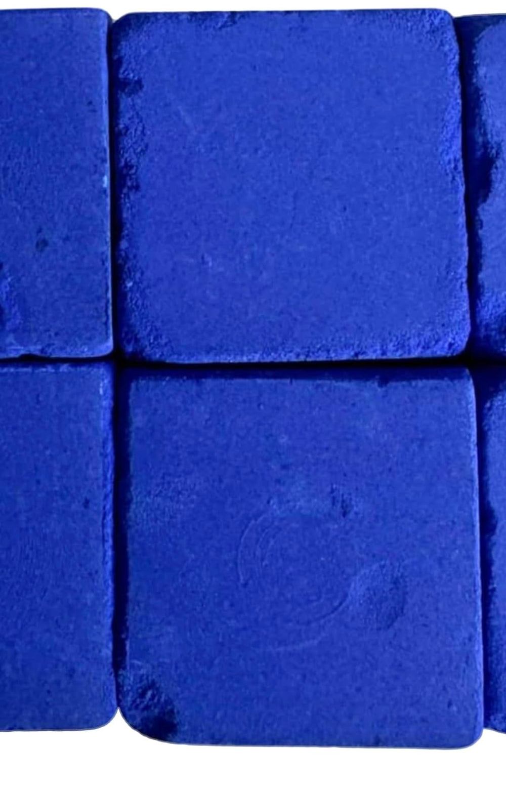 Generic Blue Squares Whitener dissolving in water delivers safe fabric brightening.