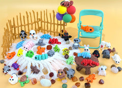 Generic desk decor with mini animals adds color and charm to workspaces.
