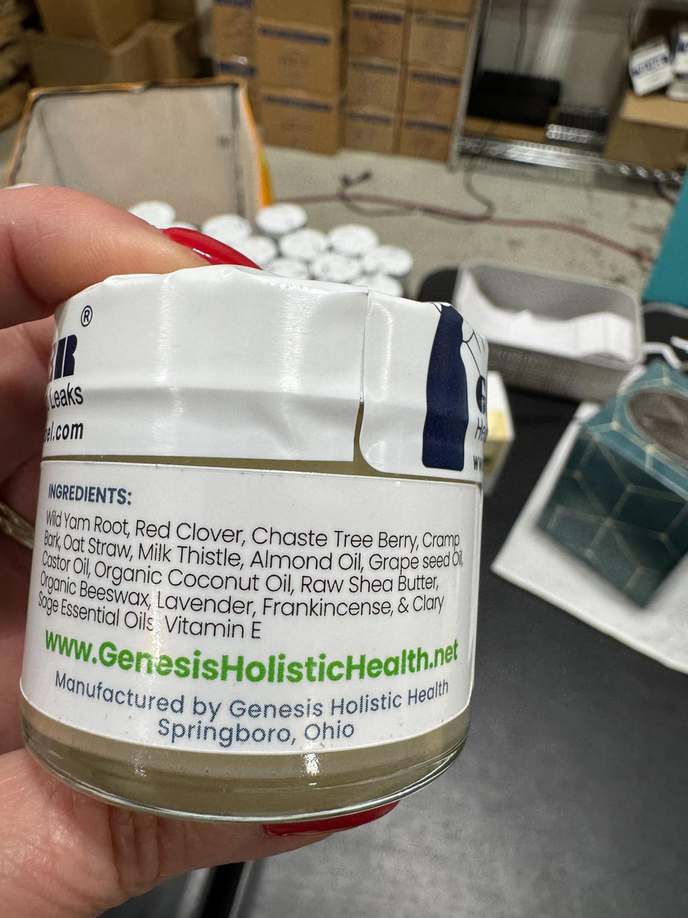 Application close-up of Genesis Wild Yam Root Cream demonstrating quick absorption.