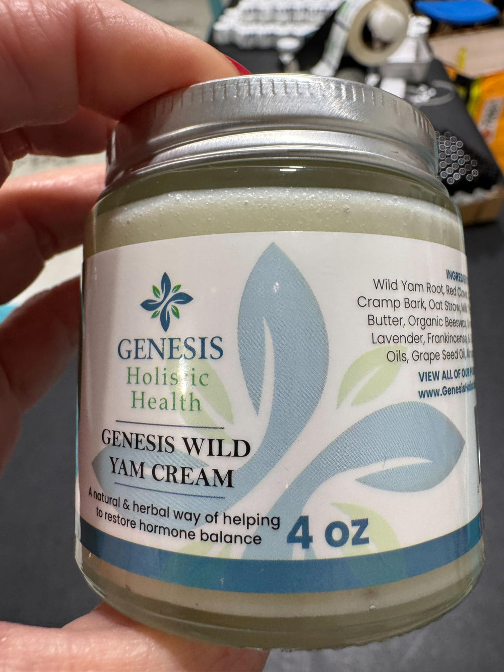 Genesis Wild Yam Root Cream application demonstrates gentle massage for daily skincare routine.