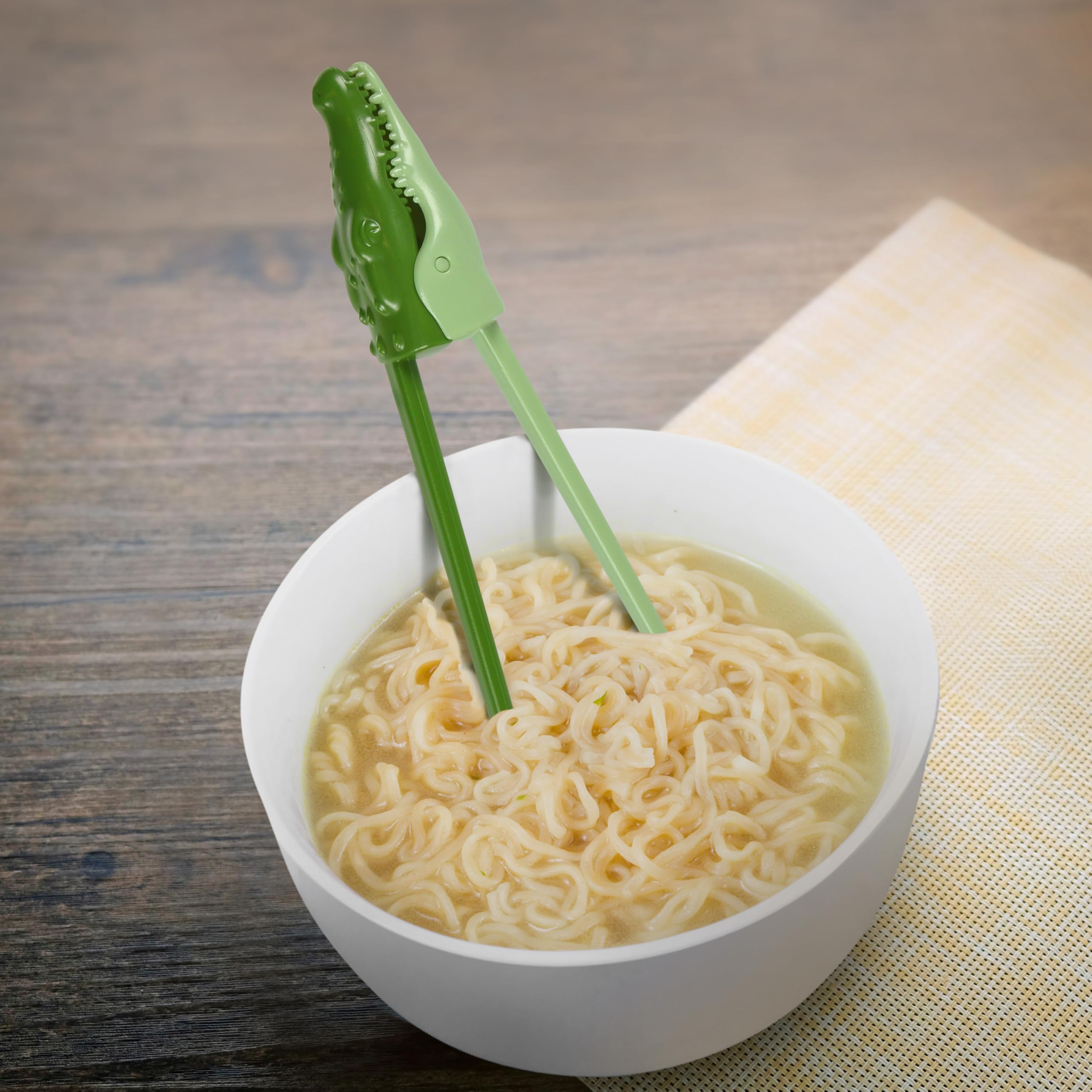 Genuine Fred MUNCHTIME crocodile chopsticks feature an easy open-close design for beginners