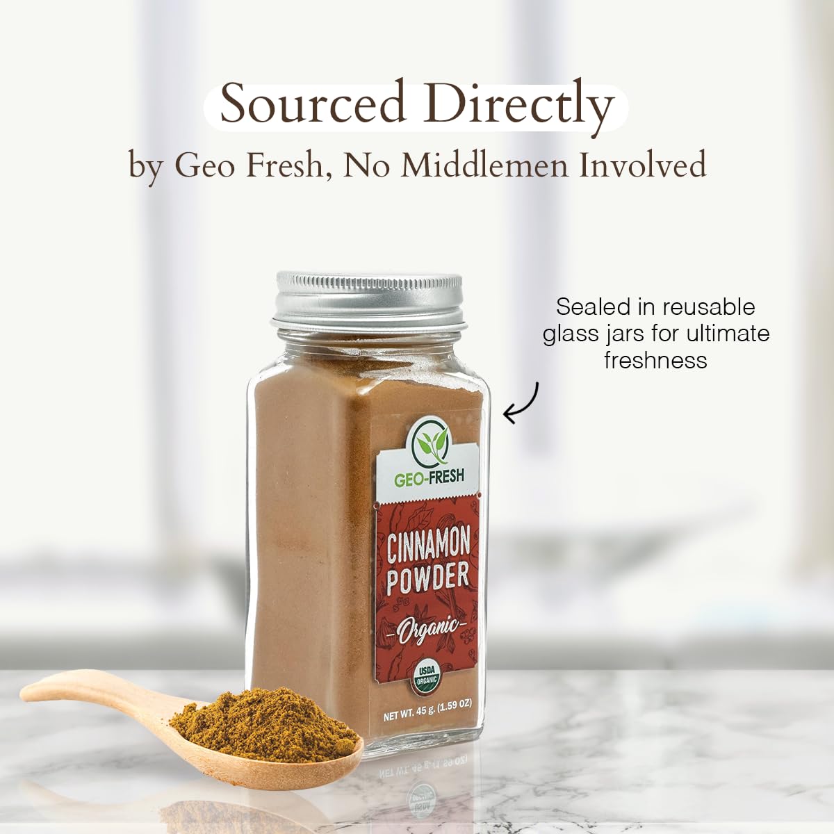 Geo-Fresh Cinnamon Powder being poured from the jar into a spoon.