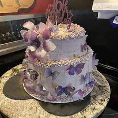 GEORLD edible wafer butterflies to decorate cupcakes with a rich purple color.