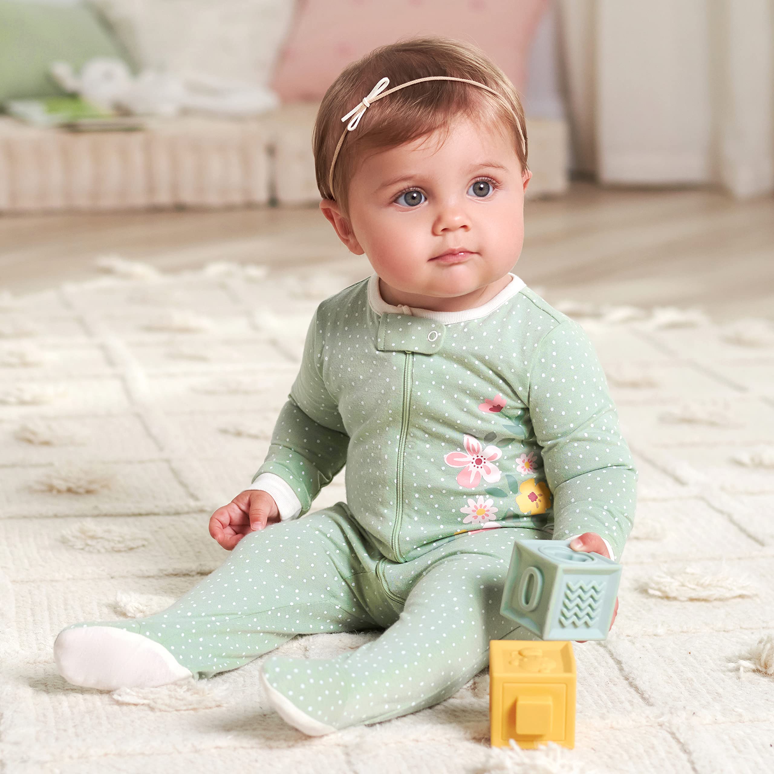 Gerber Sleep ’n Plays golden floral footed design in soft fabric.