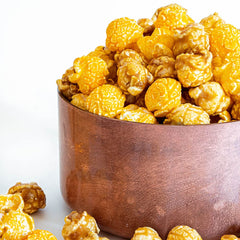 G.H. Cretors cheese & caramel popcorn in a bowl for movie night.