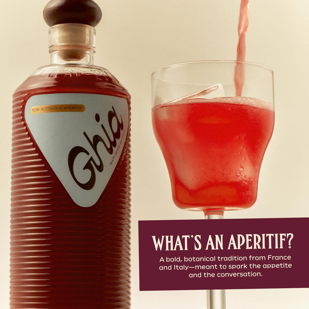 Ghia aperitif bottle with green garnish evokes Mediterranean sipping ritual.