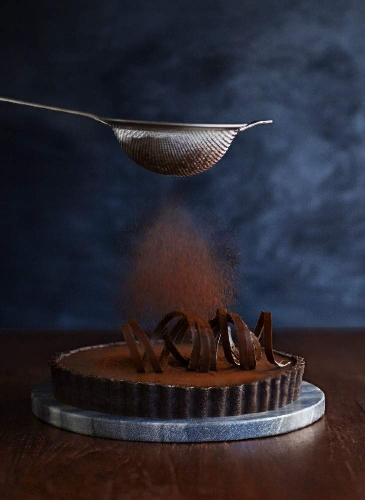 Ghirardelli Majestic Dutch Cocoa Powder ideal for hot beverages.